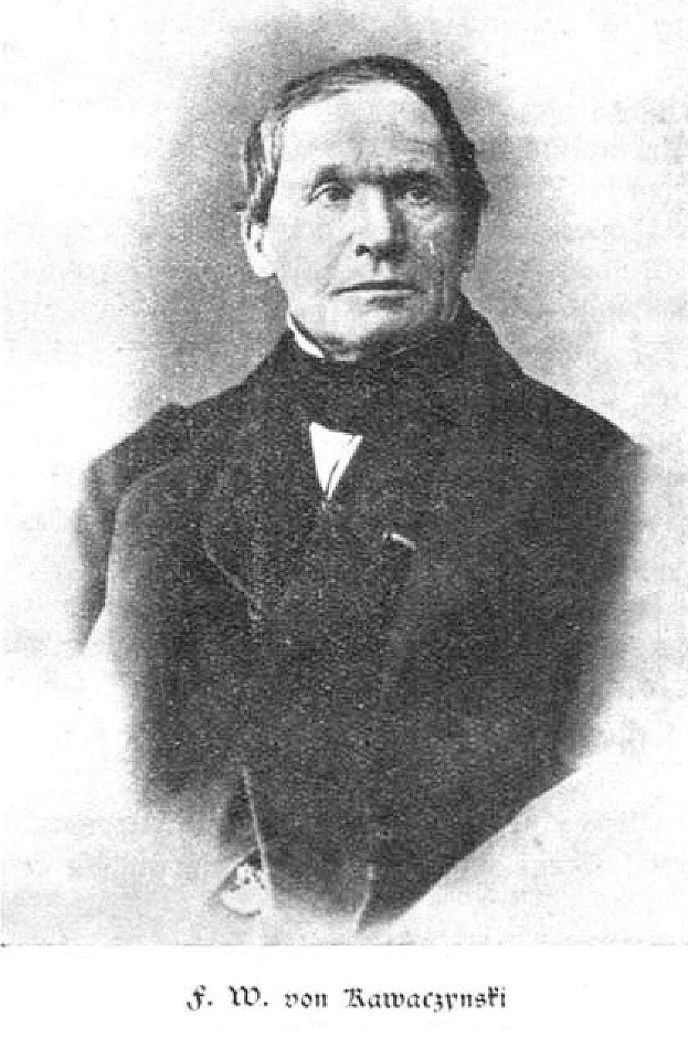 Schwarzes und weißes Porträt eines Mannes in einem Anzug, der mutmaßlich F. W. von Kawaczynski ist, der auf einem Stuhl sitzt und nach vorne schaut.