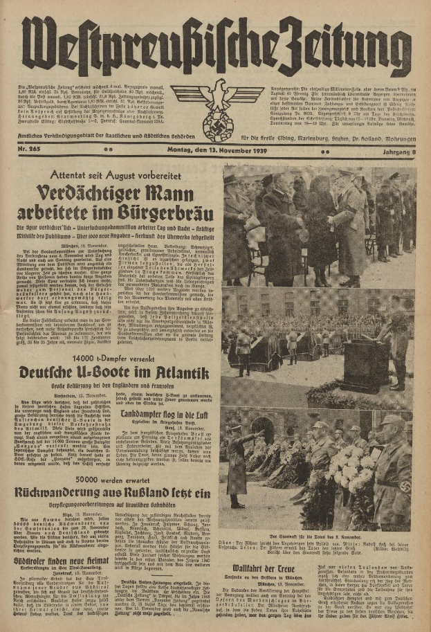 Schwarze-weiße Titelseite einer deutschen Zeitung vom 13. November 1939 mit der Überschrift "Weitpreubliche Zeitung", die eine Gruppe von Menschen in traditioneller deutscher Tracht in einer festlichen Umgebung zeigt.