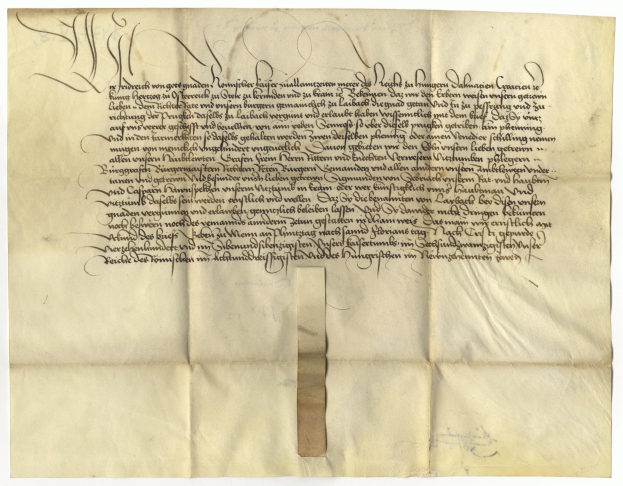 Gelbes Papier mit schwarzer Handschrift von der deutschen Regierung, in dem die Freigabe eines Gesuchs für den Tod eines Mannes erbeten wird.