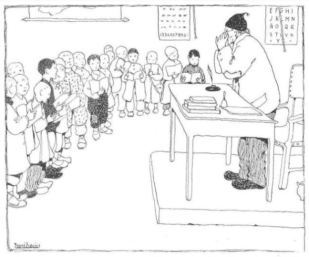 Ein Mann sitzt an einem Schreibtisch mit Büchern und Gegenständen vor einer Gruppe von Kindern, mit Papieren an der Wand dahinter, was darauf hinweist, dass er ein Lehrer ist.