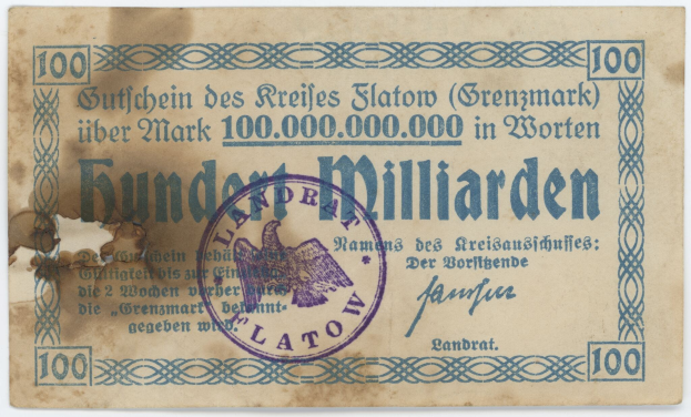 Alte deutsche Banknote mit dem Text "Grenzmark 100,000,000" und einem violetten Stempel auf einem weißen Hintergrund.